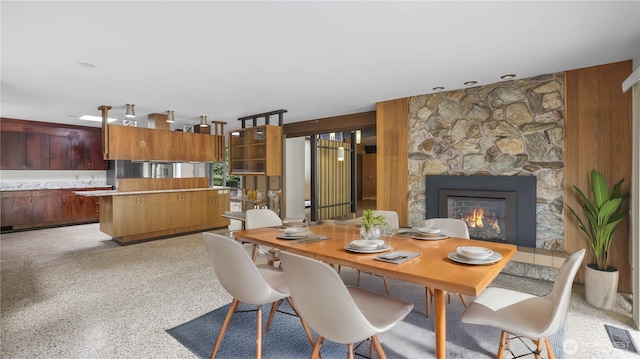 16 Riverview Dr NE, Auburn, WA 98002 - dining space featuring a stone fireplace