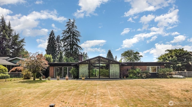 16 Riverview Dr NE, Auburn, WA 98002 - rear view of house with a chimney and brick siding