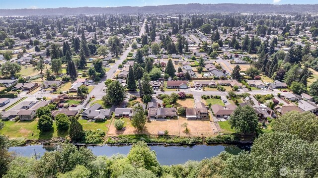 16 Riverview Dr NE, Auburn, WA 98002 - aerial overview of property's location with nearby suburban area and a large body of water