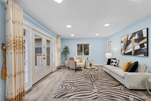 4530 240th St SW, Mountlake Terrace, WA 98043 - living area featuring french doors, light wood-style flooring, baseboards, and recessed lighting