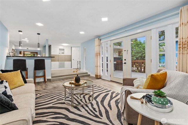4530 240th St SW, Mountlake Terrace, WA 98043 - living room featuring french doors, light wood finished floors, recessed lighting, and baseboards
