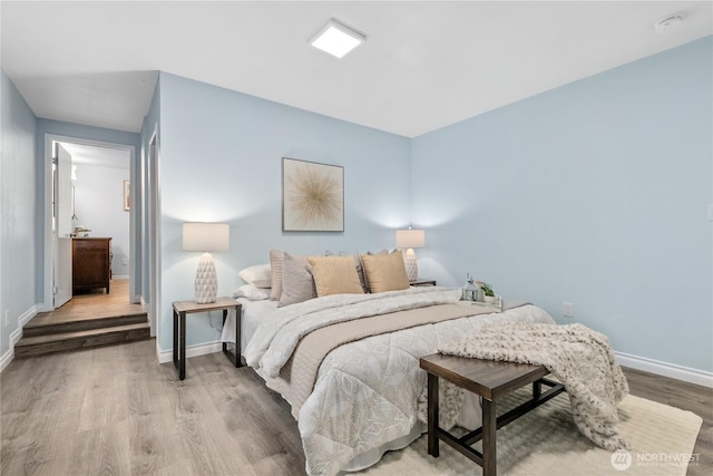 4530 240th St SW, Mountlake Terrace, WA 98043 - bedroom featuring wood finished floors and baseboards