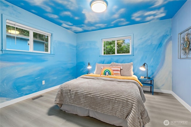 4530 240th St SW, Mountlake Terrace, WA 98043 - bedroom featuring baseboards and wood finished floors