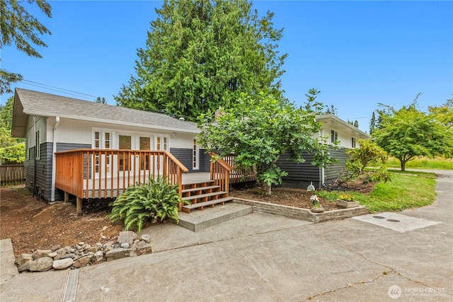 4530 240th St SW, Mountlake Terrace, WA 98043 - view of front of property featuring a deck, french doors, and roof with shingles