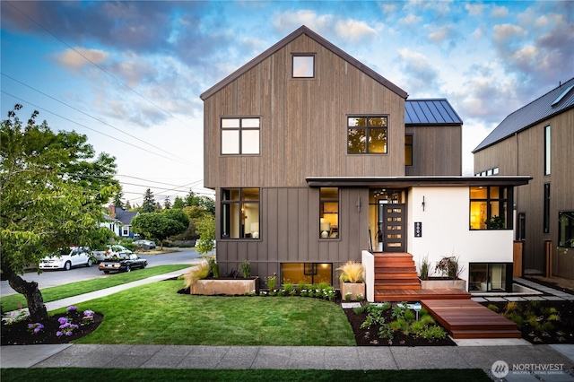 8004 39th Ave SW, Seattle, WA 98136 - view of front of property featuring a standing seam roof, a front lawn, and metal roof
