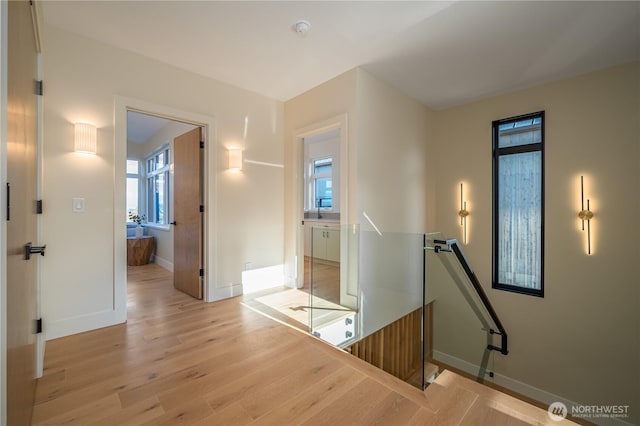 8004 39th Ave SW, Seattle, WA 98136 - hall featuring baseboards and light wood-style flooring