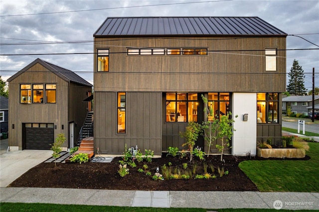 8004 39th Ave SW, Seattle, WA 98136 - modern inspired farmhouse with a garage, stairs, driveway, and metal roof