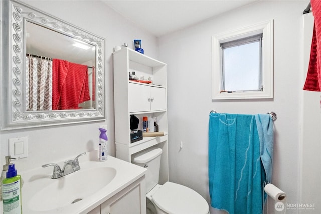 4248 A St SE Unit 518, Auburn, WA 98002 - bathroom featuring toilet and vanity