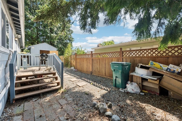 4248 A St SE Unit 518, Auburn, WA 98002 - fenced backyard featuring an outdoor structure