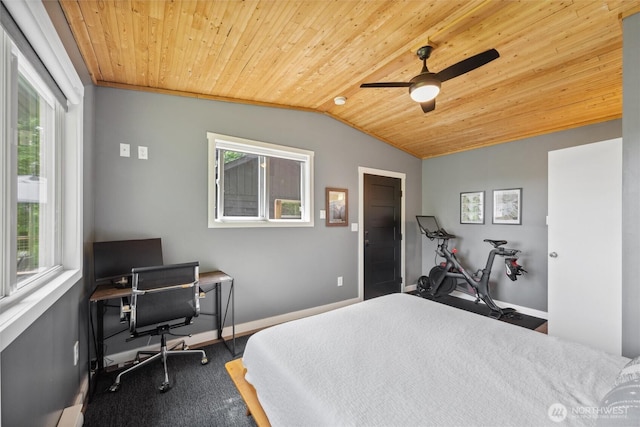1188 Island Dr, Lummi Island, WA 98262 - carpeted bedroom with wooden ceiling, vaulted ceiling, an office area, baseboards, and a ceiling fan
