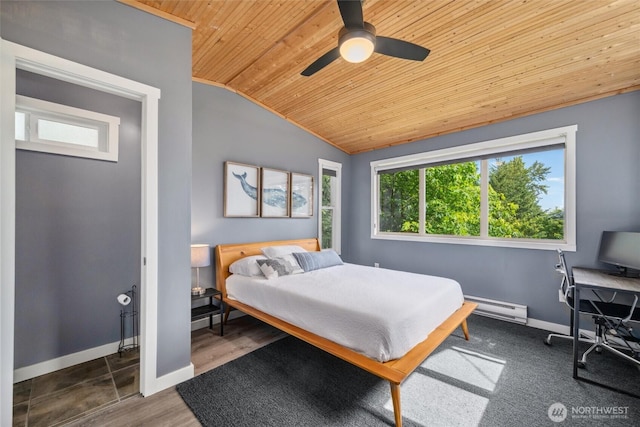 1188 Island Dr, Lummi Island, WA 98262 - bedroom featuring wooden ceiling, a baseboard radiator, vaulted ceiling, baseboards, and ceiling fan