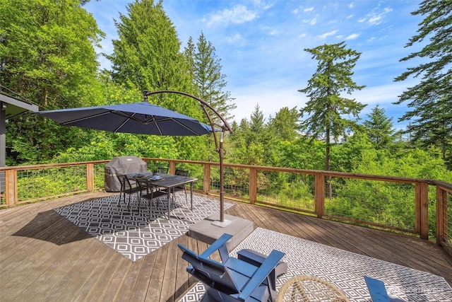 1188 Island Dr, Lummi Island, WA 98262 - wooden terrace featuring a grill and outdoor dining space