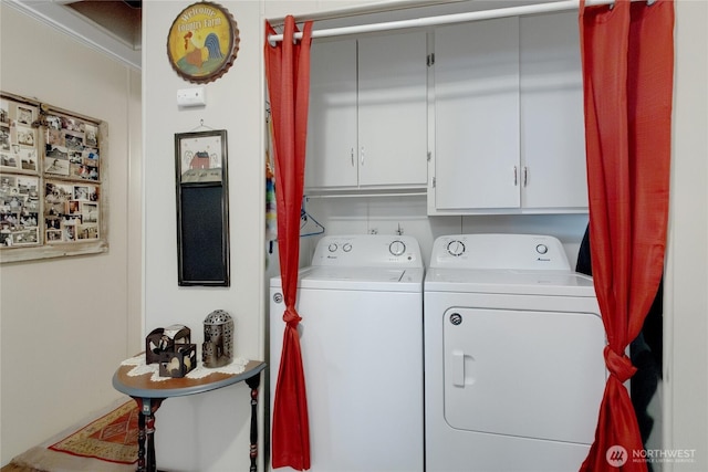 25513 37th Ave E, Spanaway, WA 98387 - washroom featuring washer and dryer and cabinet space