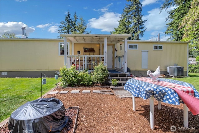 25513 37th Ave E, Spanaway, WA 98387 - rear view of property with central AC and a yard