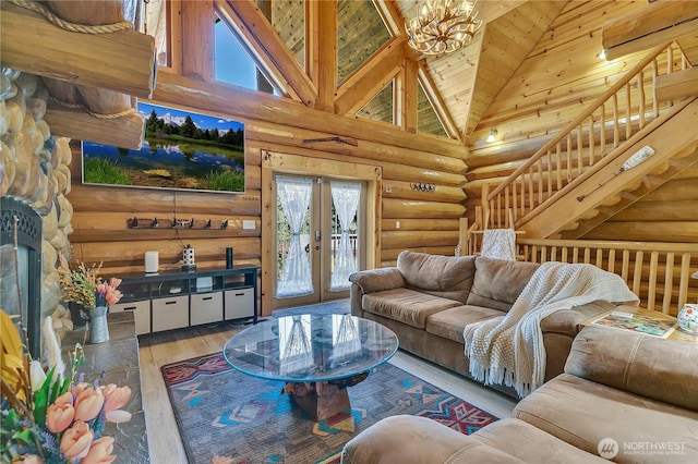 19219 SE 299th Pl, Kent, WA 98042 - living room with rustic walls, high vaulted ceiling, french doors, hardwood / wood-style flooring, and a chandelier