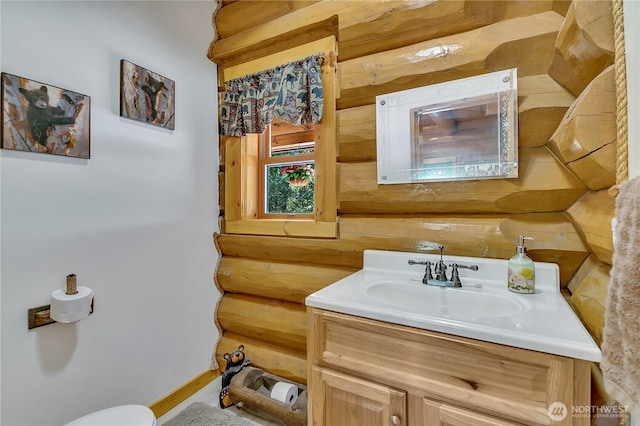 19219 SE 299th Pl, Kent, WA 98042 - half bathroom featuring vanity, log walls, and toilet