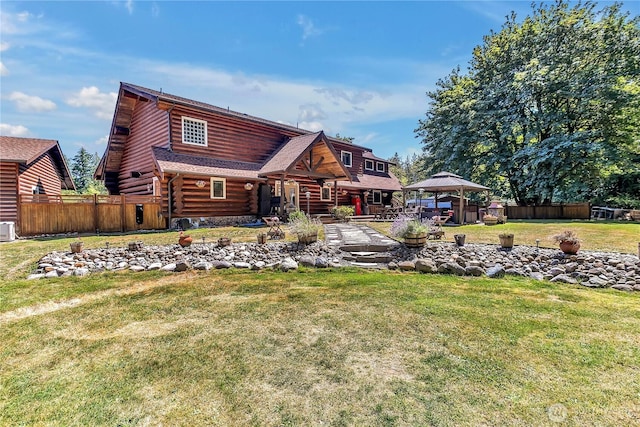 19219 SE 299th Pl, Kent, WA 98042 - rear view of house with a gazebo, log siding, a shingled roof, and a patio area