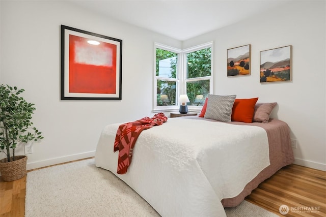 369 NW 49th St, Seattle, WA 98107 - bedroom featuring baseboards and wood finished floors