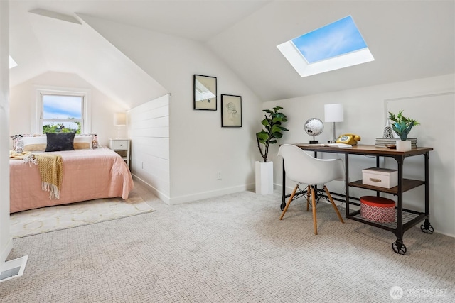 369 NW 49th St, Seattle, WA 98107 - carpeted bedroom featuring vaulted ceiling, a skylight, a desk, and baseboards