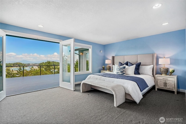 573 Klamath Dr, La Conner, WA 98257 - bedroom featuring carpet, access to exterior, baseboards, and recessed lighting