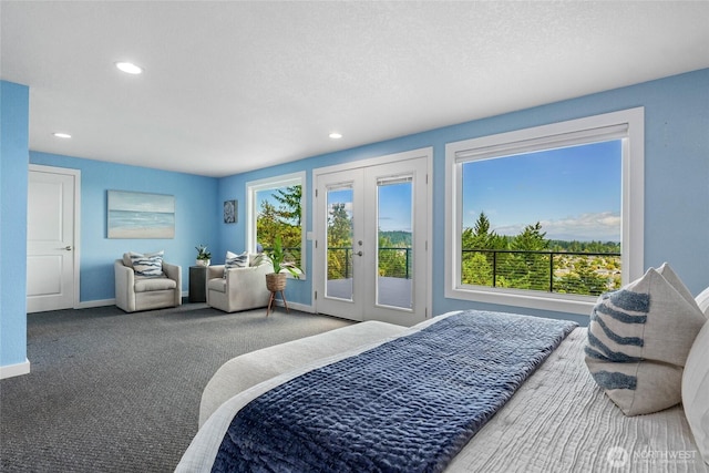 573 Klamath Dr, La Conner, WA 98257 - bedroom featuring french doors, access to exterior, multiple windows, recessed lighting, and baseboards
