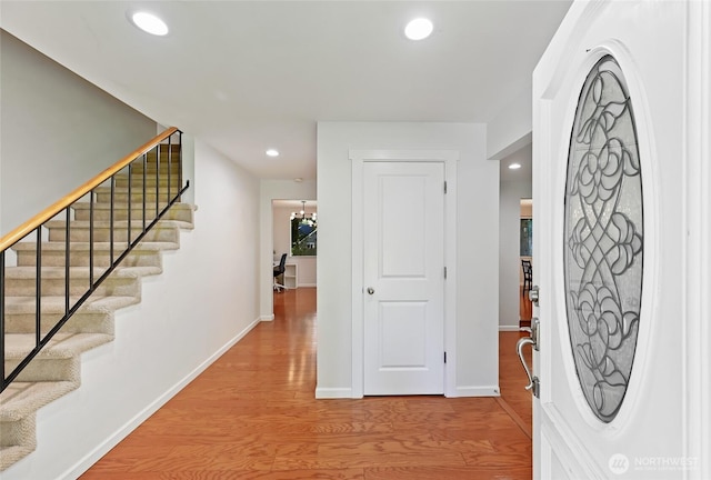 14208 93rd Ave NE, Kirkland, WA 98034 - foyer entrance featuring stairs, wood finished floors, recessed lighting, and baseboards