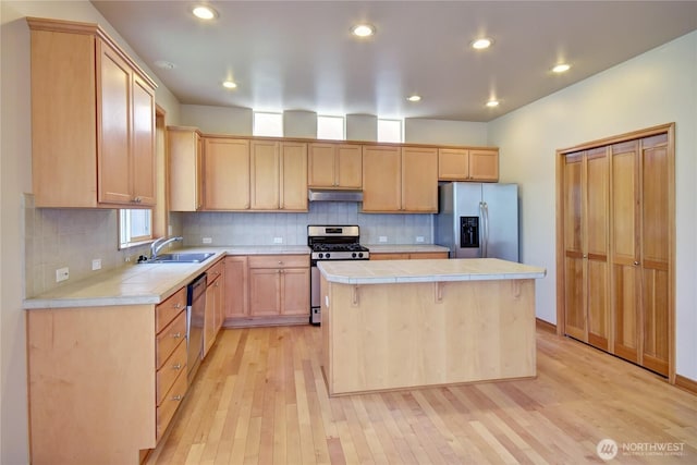 19402 NE 68th Way, Redmond, WA 98052 - kitchen with appliances with stainless steel finishes, a sink, light brown cabinets, a center island, and recessed lighting