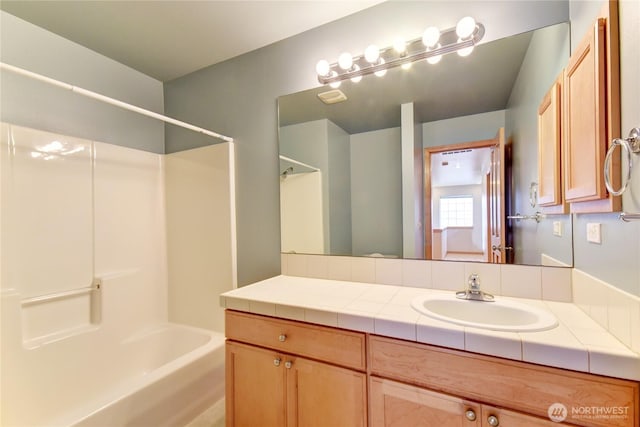 19402 NE 68th Way, Redmond, WA 98052 - bathroom featuring shower / washtub combination and vanity