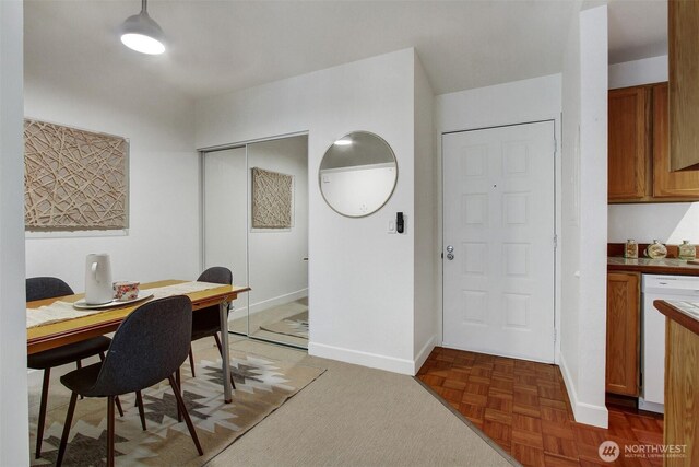 9512 1st Ave NE Unit 402, Seattle, WA 98115 - dining room featuring baseboards