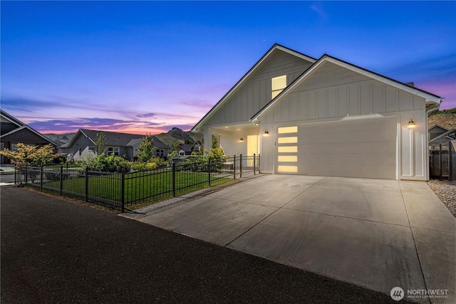 1007 Racine Springs Dr, Wenatchee, WA 98801 - view of front of home with board and batten siding, driveway, and an attached garage