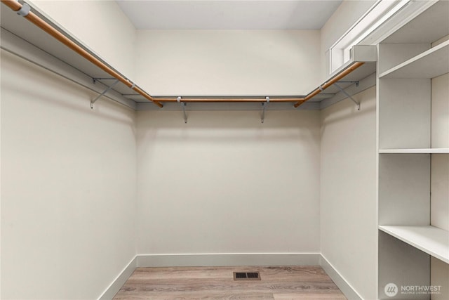 1007 Racine Springs Dr, Wenatchee, WA 98801 - walk in closet featuring wood finished floors