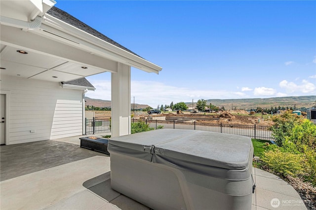 1007 Racine Springs Dr, Wenatchee, WA 98801 - fenced backyard with a hot tub and a patio