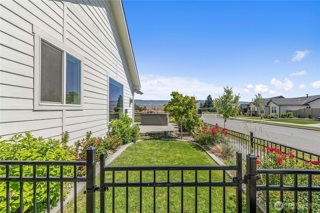 1007 Racine Springs Dr, Wenatchee, WA 98801 - view of yard with a gate and a residential view