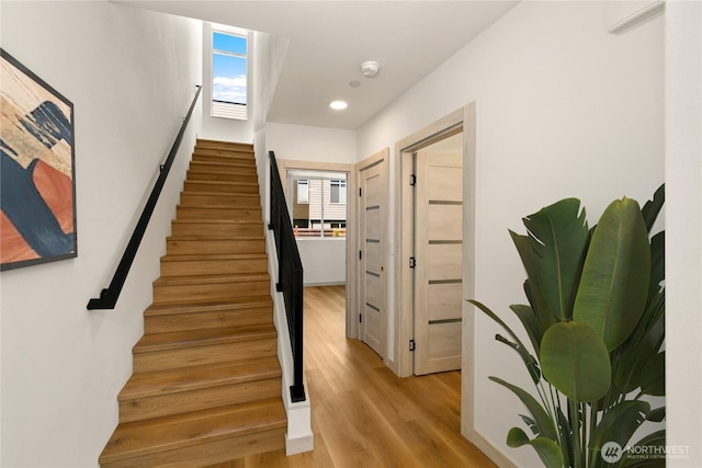4306 S Holden St, Seattle, WA 98118 - stairs with wood finished floors and recessed lighting