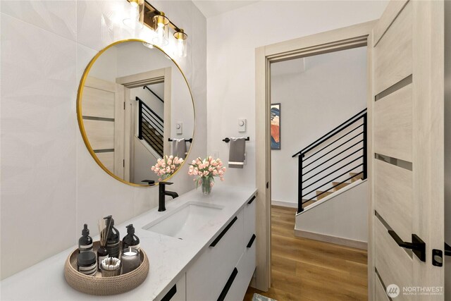 4306 S Holden St, Seattle, WA 98118 - bathroom with wood finished floors and vanity