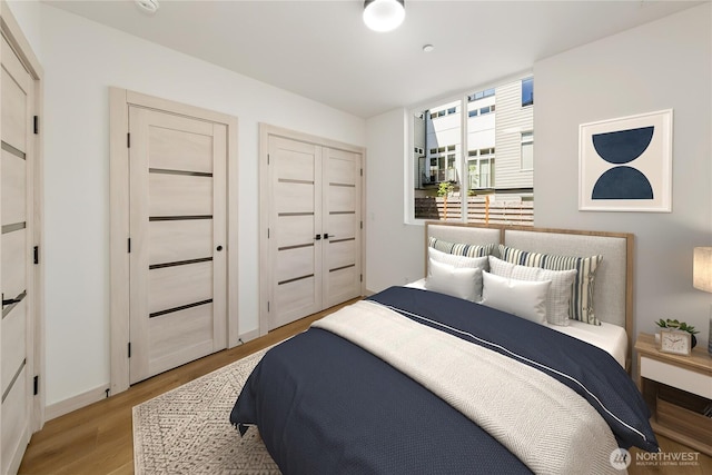4306 S Holden St, Seattle, WA 98118 - bedroom featuring light wood finished floors