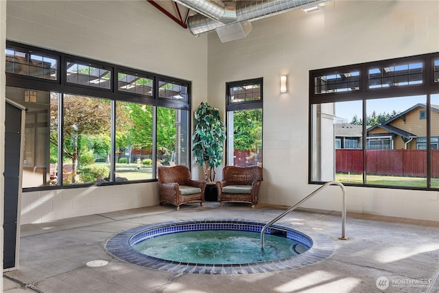 4972 Spokane St NE, Lacey, WA 98516 - sunroom featuring a hot tub