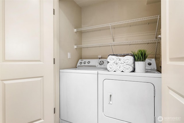 15155 NE 82nd St Unit 103, Redmond, WA 98052 - laundry room with washing machine and clothes dryer