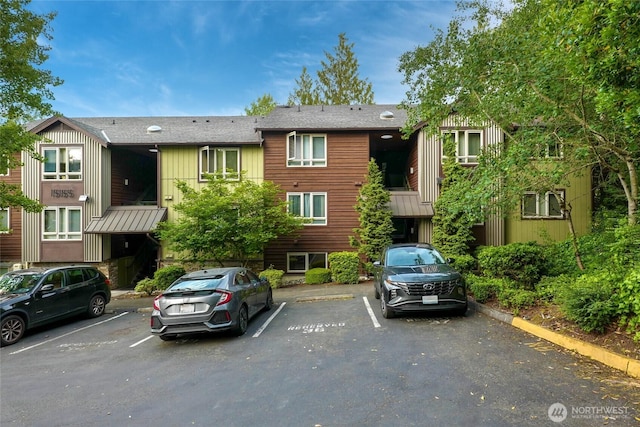 15155 NE 82nd St Unit 103, Redmond, WA 98052 - view of property featuring uncovered parking