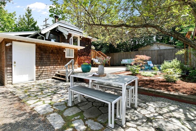 7141 47th Ave SW, Seattle, WA 98136 - view of patio / terrace with outdoor dining area