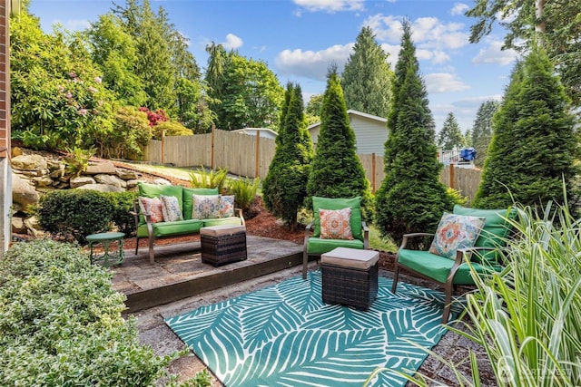 5629 146th St SW, Edmonds, WA 98026 - fenced backyard featuring outdoor lounge area and a patio area