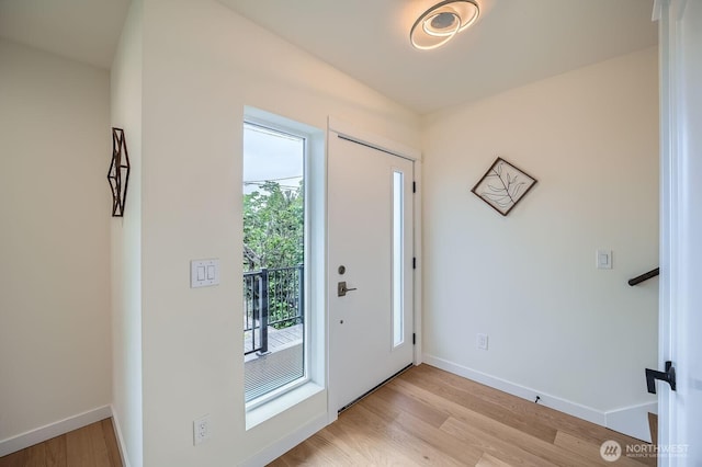 5930 18th Ave S, Seattle, WA 98108 - entrance foyer featuring light wood-style floors and baseboards