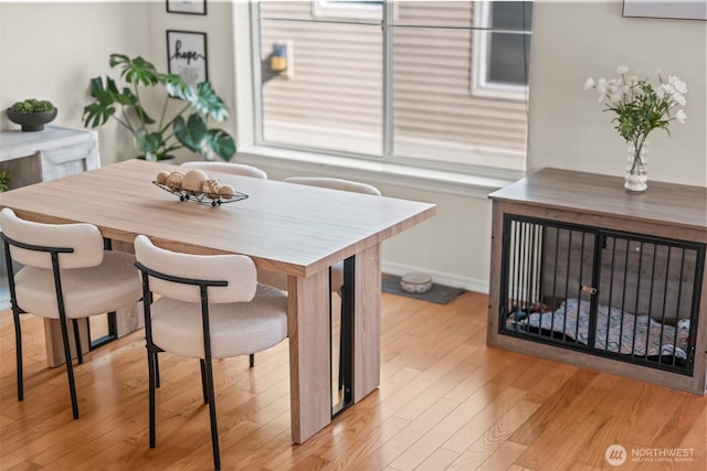 2143 Hammond Ave Unit E10, Dupont, WA 98327 - dining area featuring light wood-style floors and baseboards