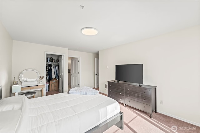 2143 Hammond Ave Unit E10, Dupont, WA 98327 - bedroom featuring carpet flooring, baseboards, and a closet
