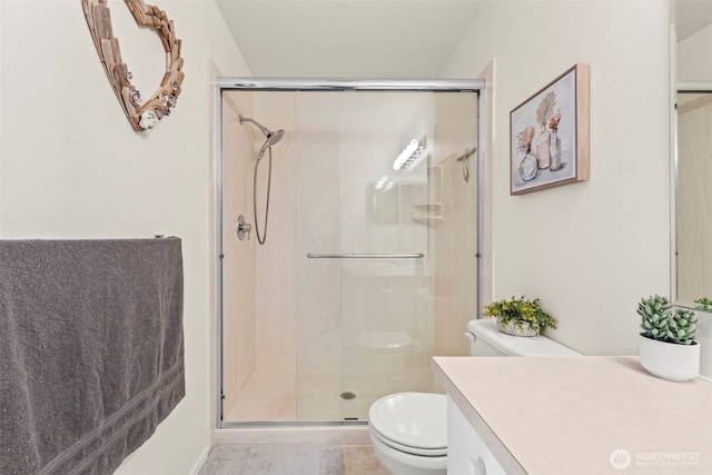 2143 Hammond Ave Unit E10, Dupont, WA 98327 - full bathroom featuring toilet, a stall shower, and vanity