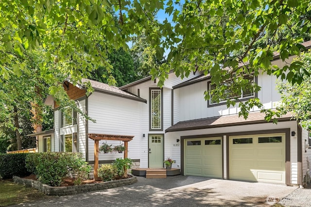 16302 NE 104th St, Redmond, WA 98052 - view of front of property featuring an attached garage and driveway