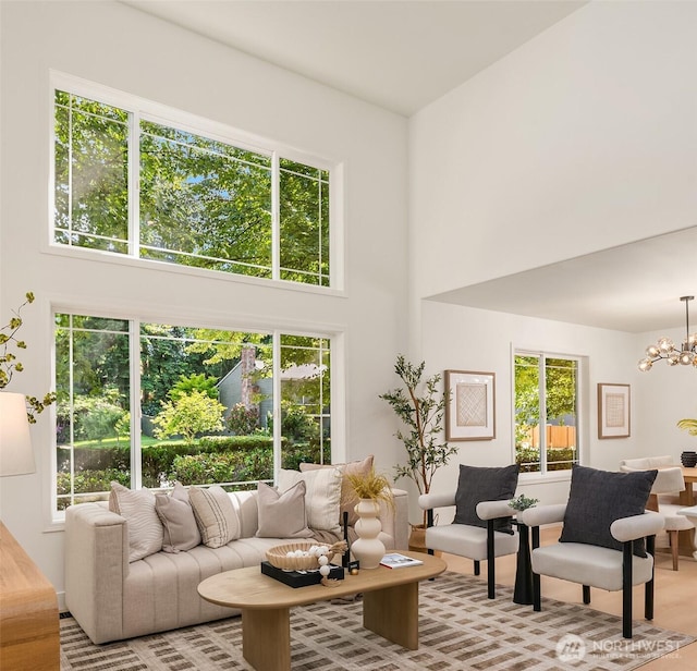 16302 NE 104th St, Redmond, WA 98052 - living area with a chandelier and a high ceiling