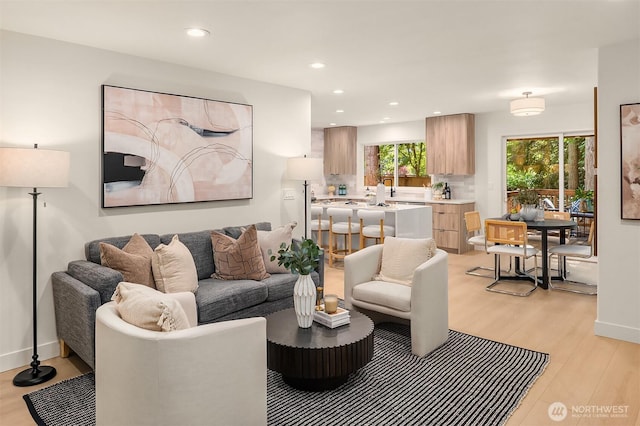 16302 NE 104th St, Redmond, WA 98052 - living room featuring light wood finished floors, recessed lighting, and baseboards