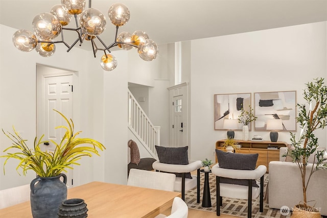 16302 NE 104th St, Redmond, WA 98052 - dining space with stairway, wood finished floors, and a chandelier