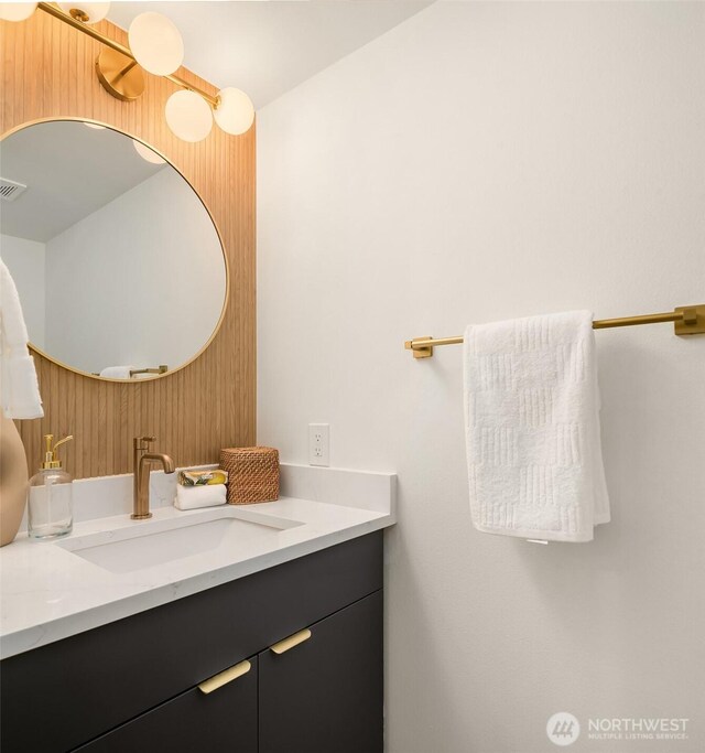 16302 NE 104th St, Redmond, WA 98052 - bathroom featuring vanity and wooden walls